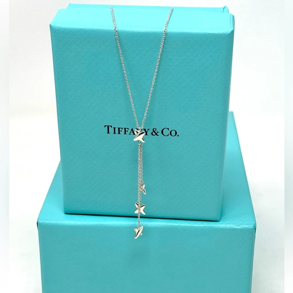 Authentic Tiffany & co. Triple X Kiss Cross Drope Necklace.